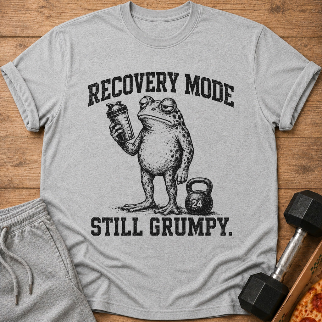Gray t-shirt with frog holding a shaker, kettlebell, and text "RECOVERY MODE STILL GRUMPY."