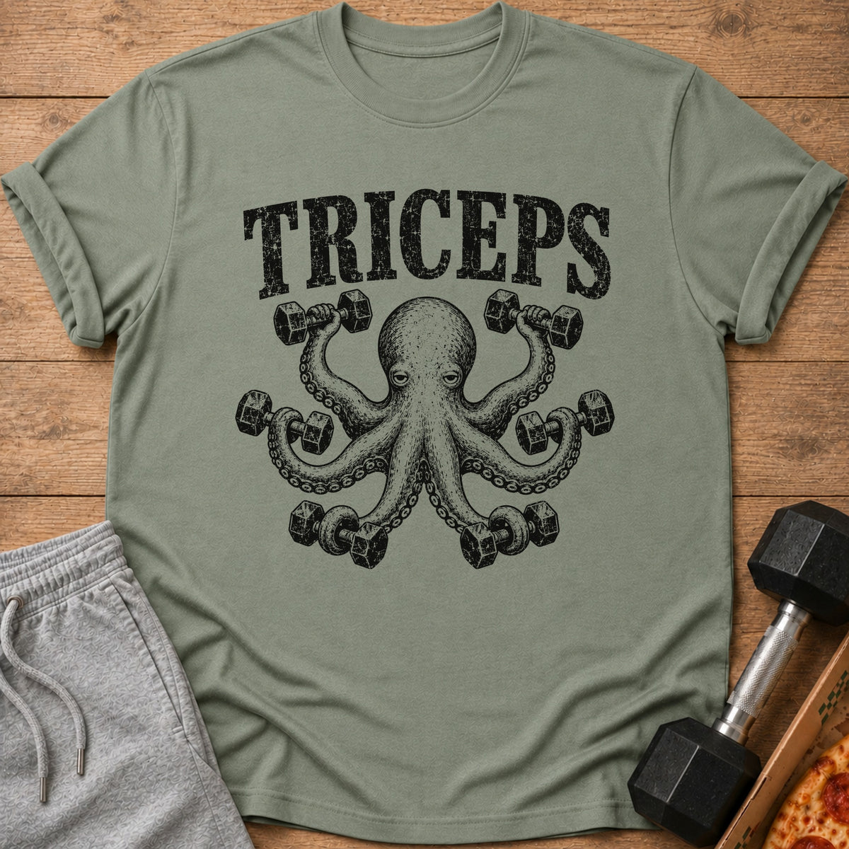 Green t-shirt with distressed "TRICEPS" text and octopus lifting dumbbells.