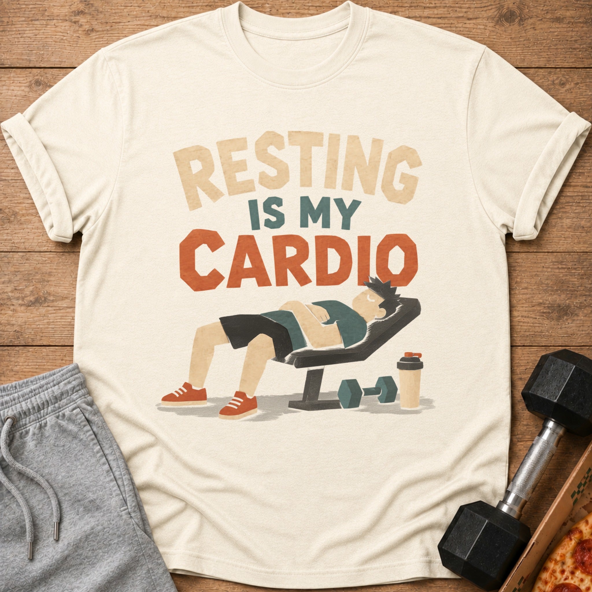T-shirt with "RESTING IS MY CARDIO" text and illustration of a man resting on a weight bench.
