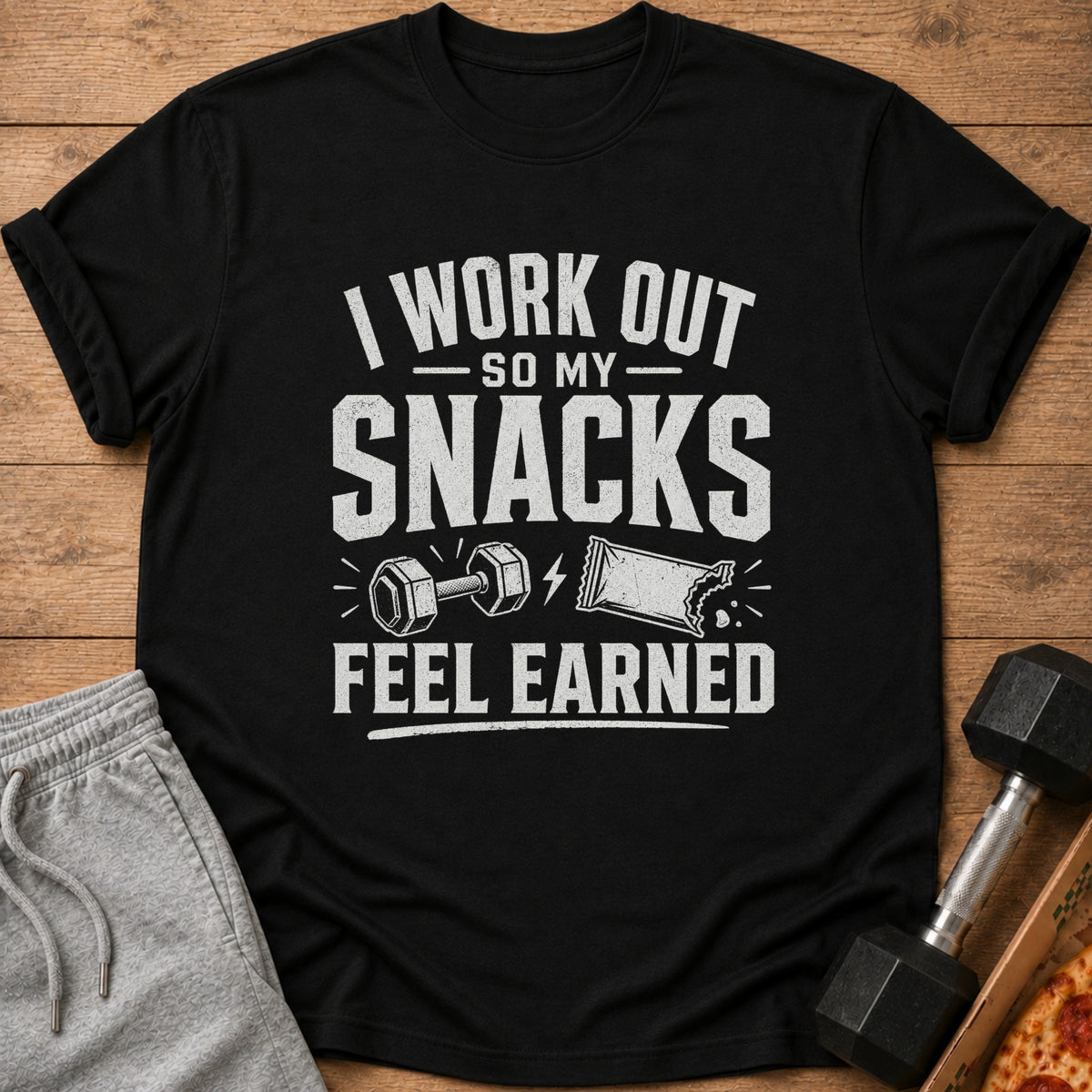Black t-shirt with "I work out so my snacks feel earned" graphic.
