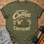 Green t-shirt with a bear holding coffee that says "CUP 1 OF MANY" and text "CAFFEINE & REGRET".