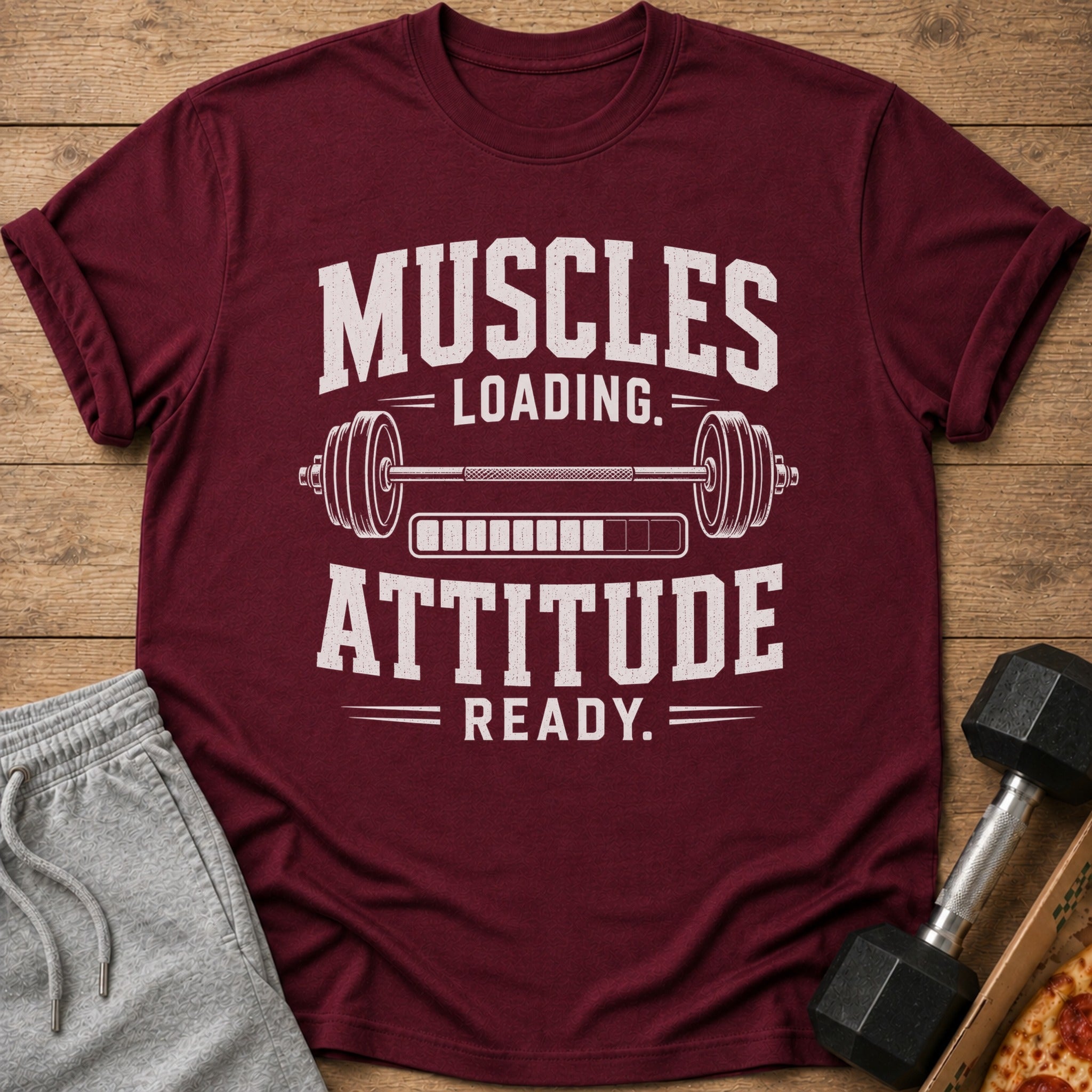 Maroon t-shirt with "Muscles Loading Attitude Ready" graphic and barbell image.
