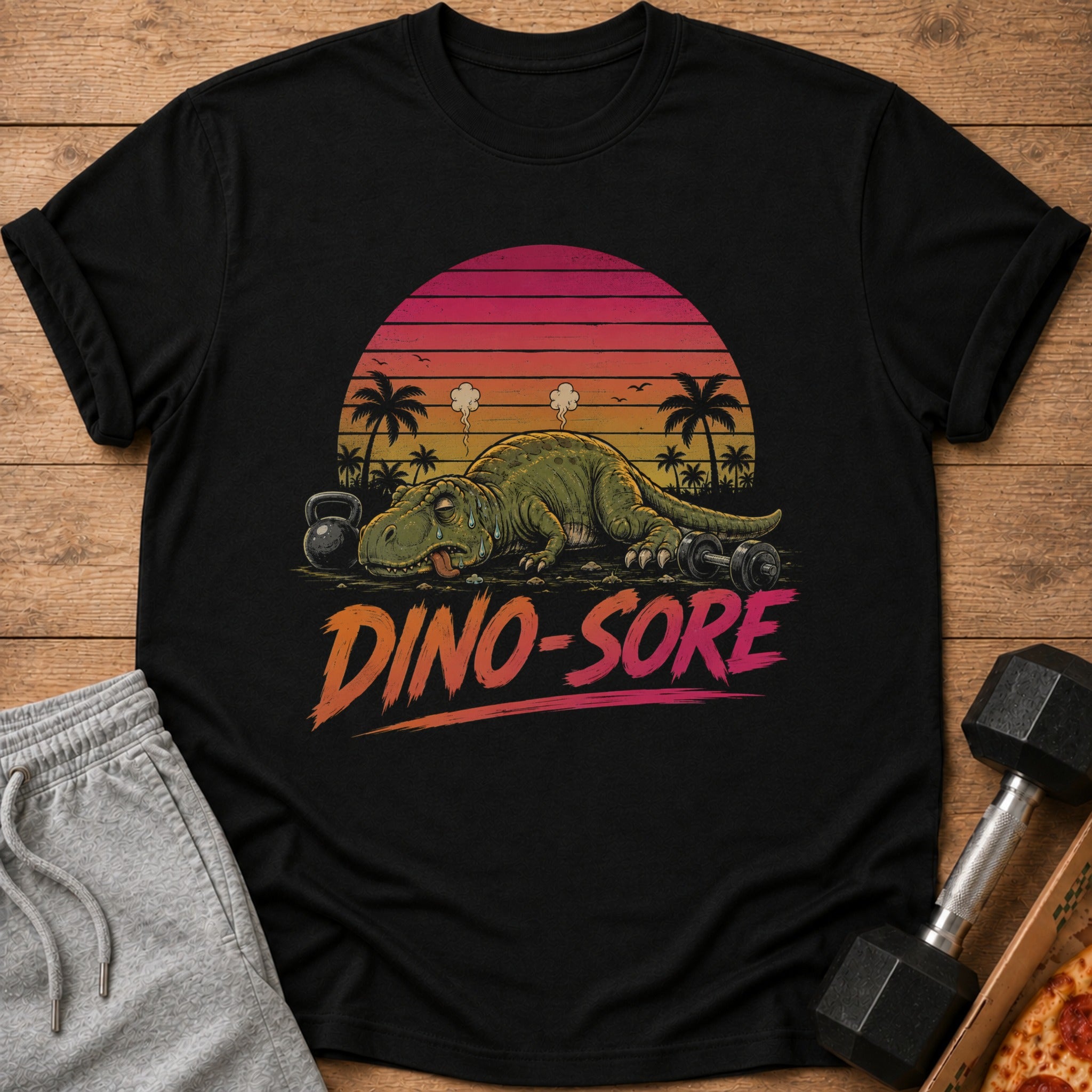 Black t-shirt with a tired dinosaur and text "DINO-SORE".