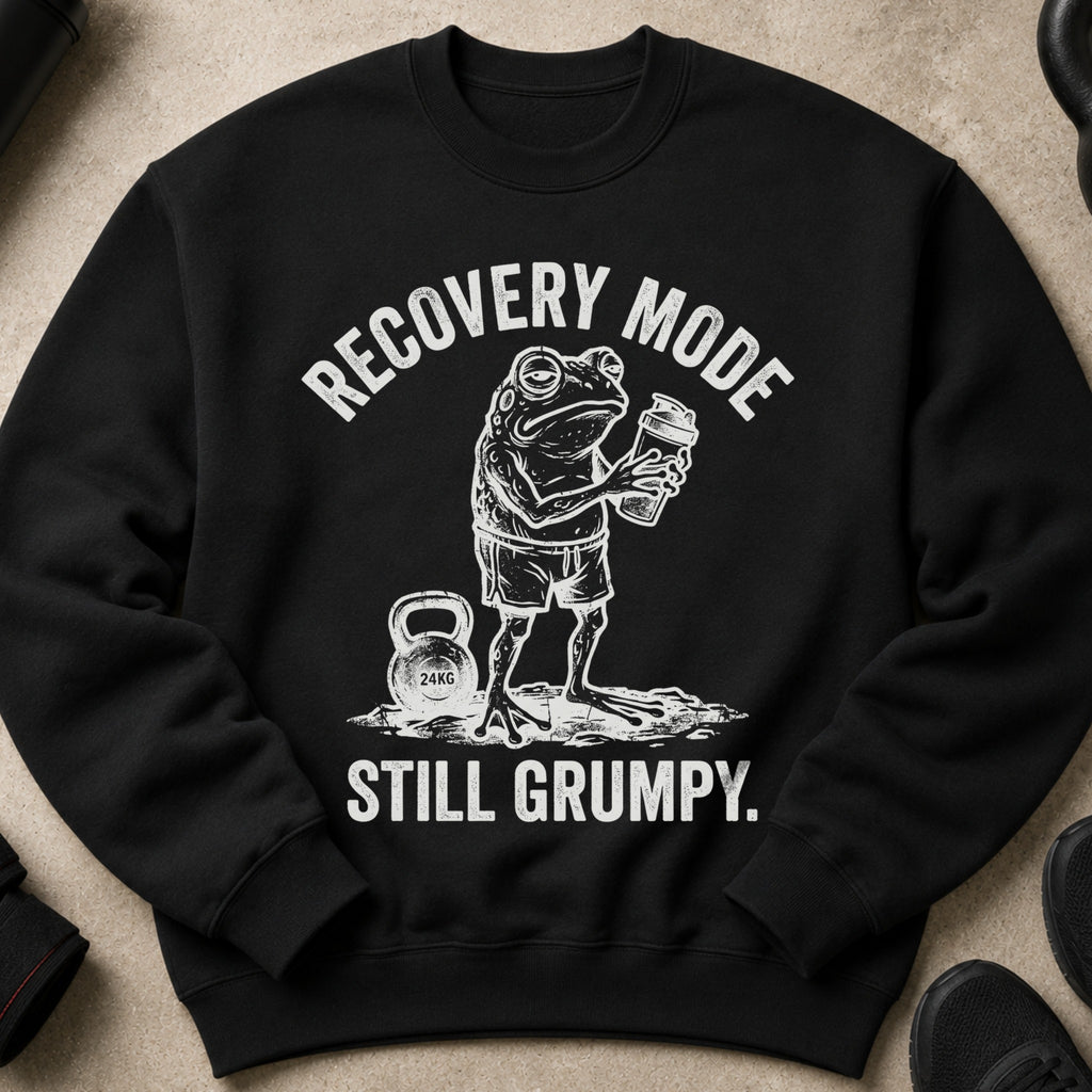 Black sweatshirt with "Recovery Mode Still Grumpy" text and a frog holding a shaker.