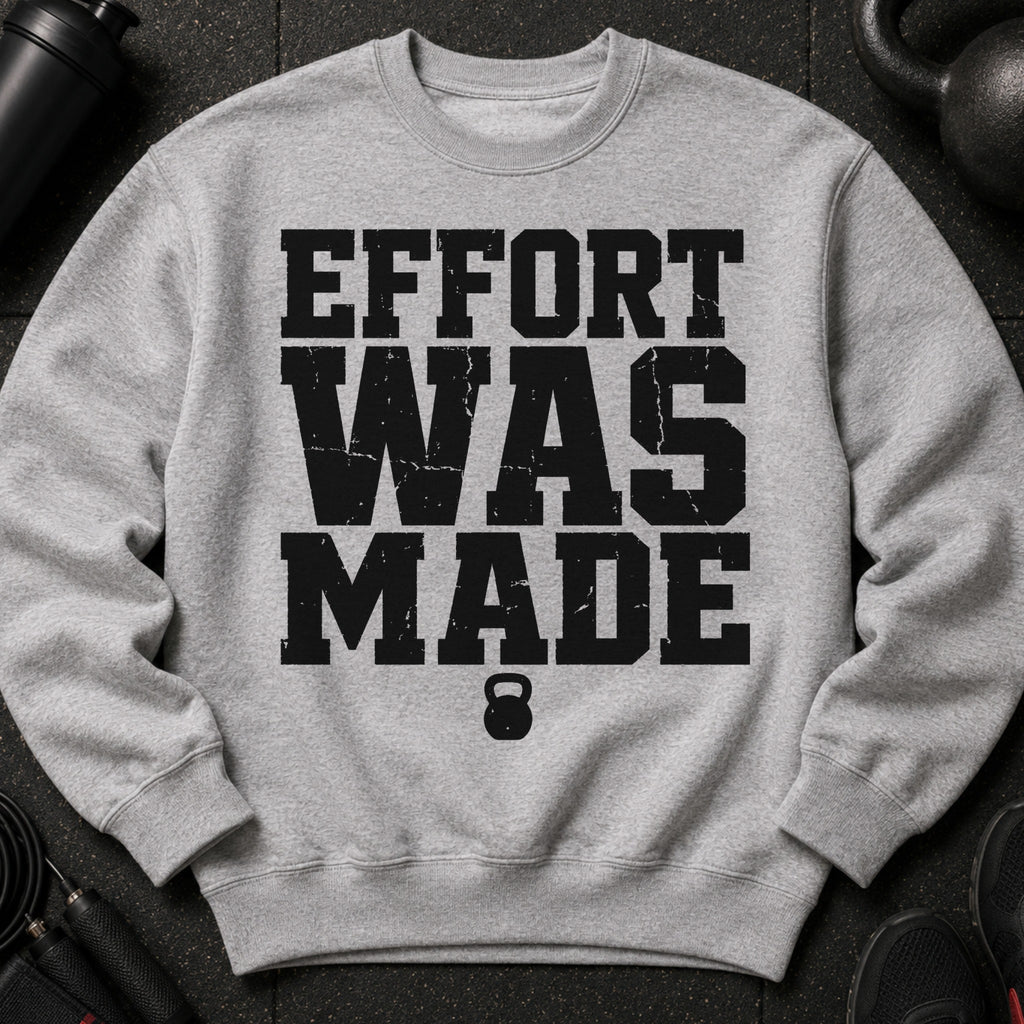 Grey sweatshirt with black text "EFFORT WAS MADE" and a kettlebell.