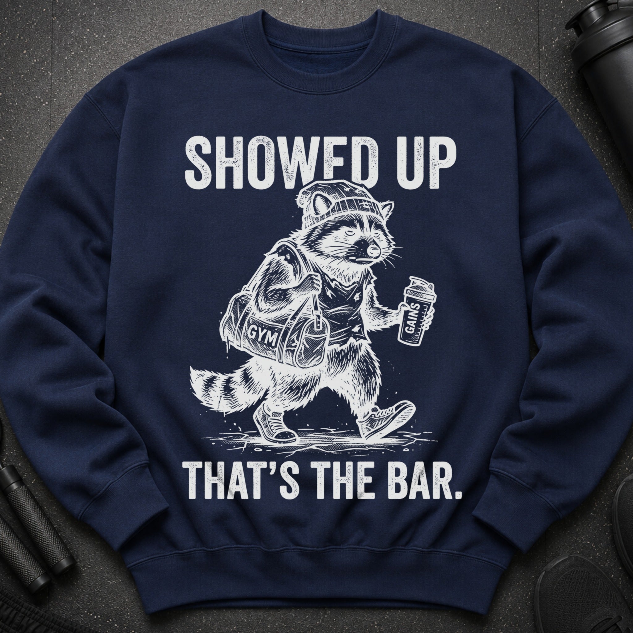 Navy sweatshirt with distressed graphic: "SHOWED UP THAT'S THE BAR."
