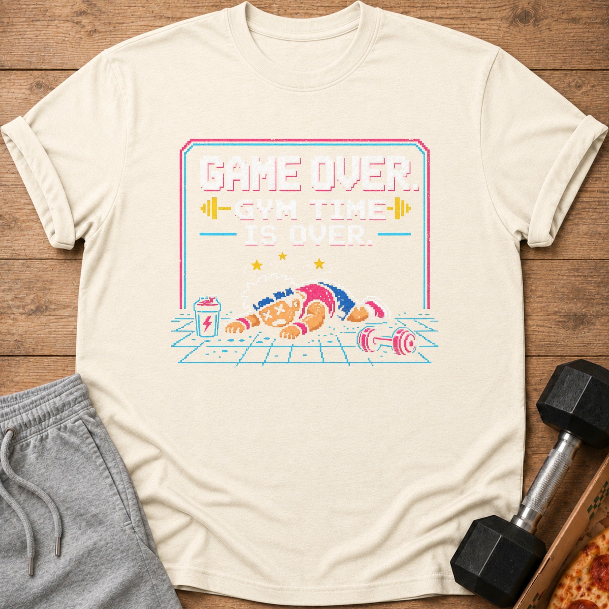 T-shirt with pixel art text "GAME OVER. GYM TIME IS OVER." and exhausted figure.