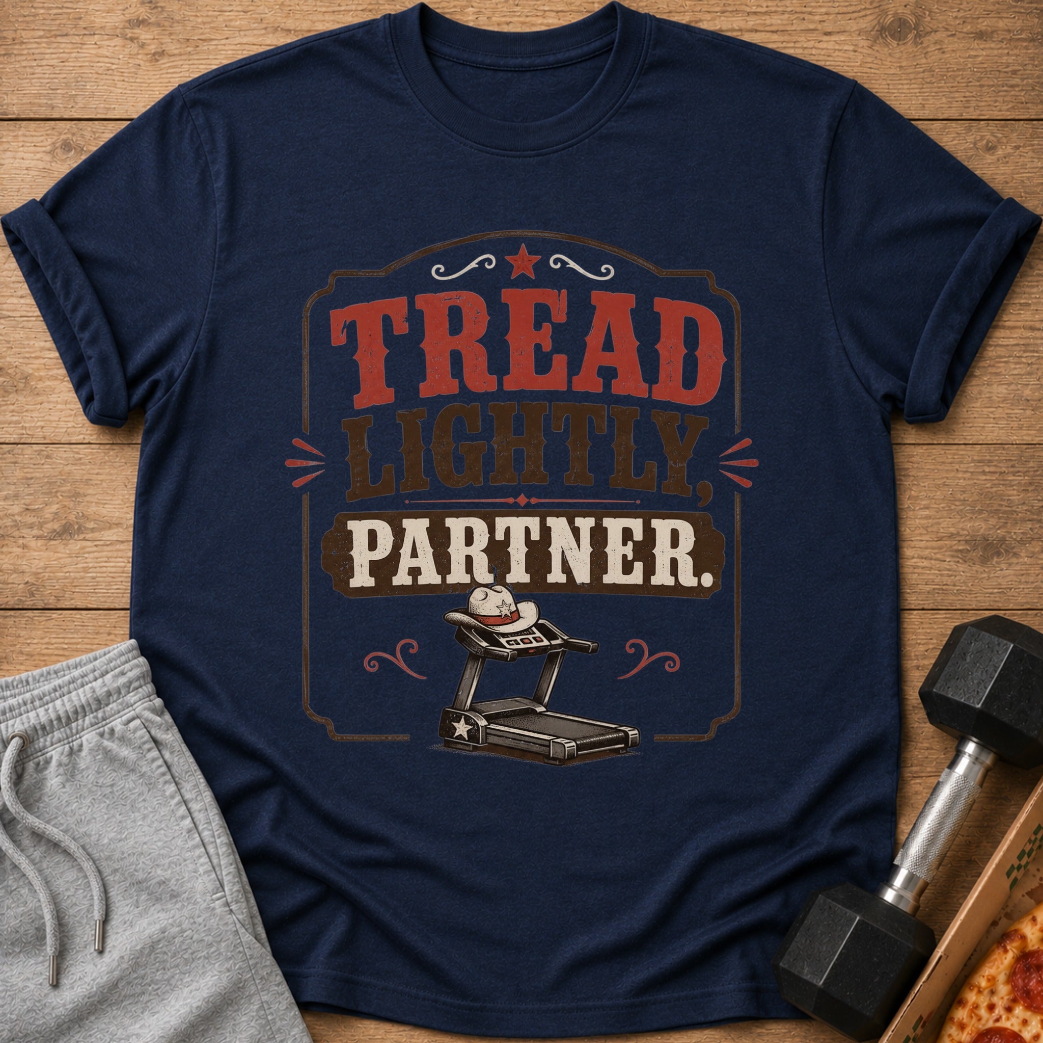 Navy t-shirt with "Tread Lightly, Partner." text and treadmill graphic.