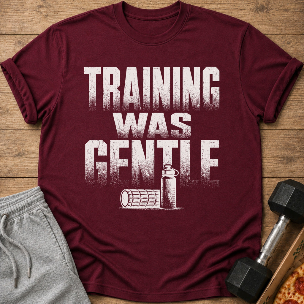 Maroon t-shirt with distressed "TRAINING WAS GENTLE" text and gym accessories.