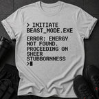 Grey t-shirt with black pixelated text: Initiate Beast Mode, Error Energy Not Found, Proceeding on Sheer Stubbornness.