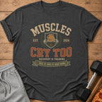 T-shirt with "Muscles Cry Too" and motivational fitness slogans.