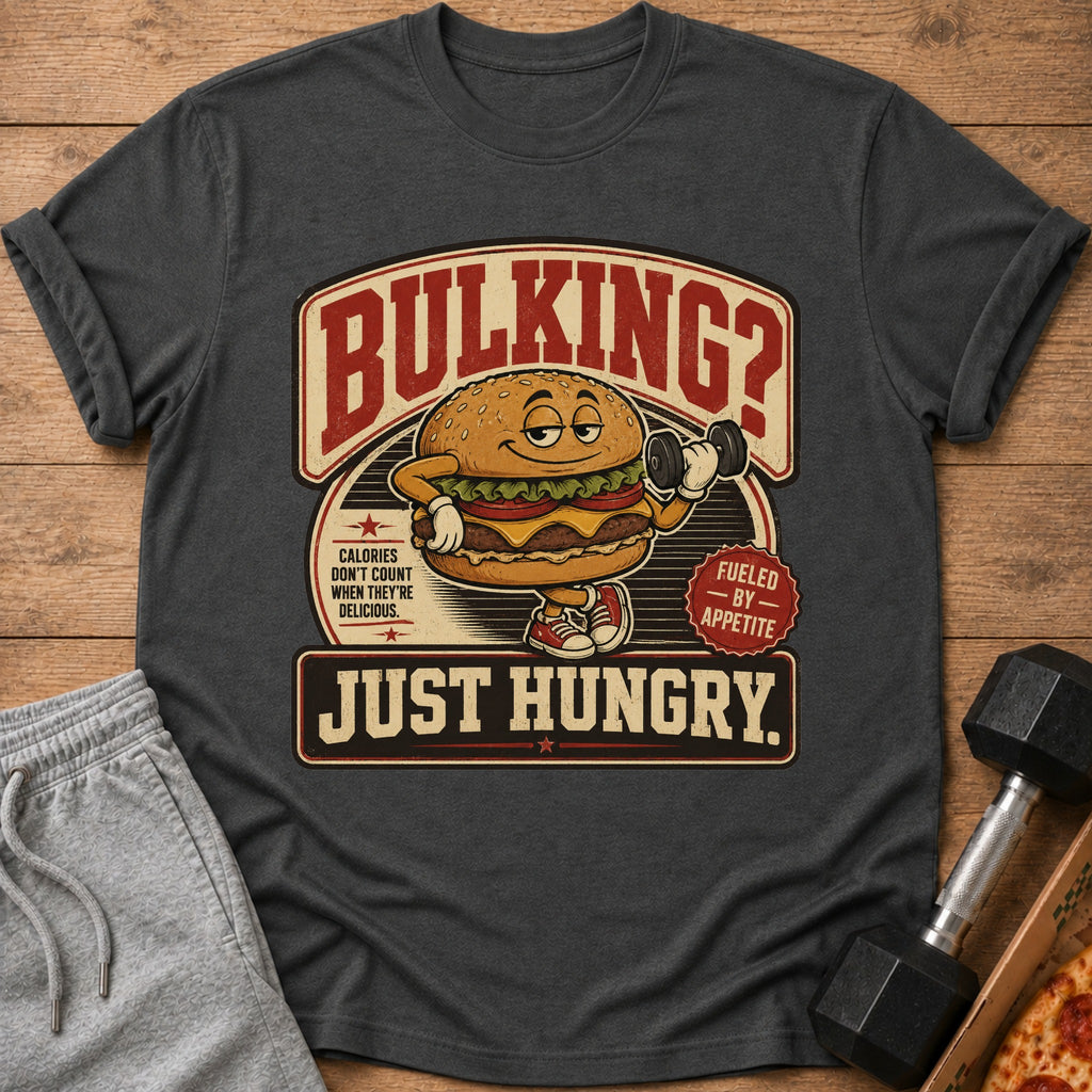 T-shirt with cartoon burger lifting dumbbell and text "Bulking? Just Hungry."