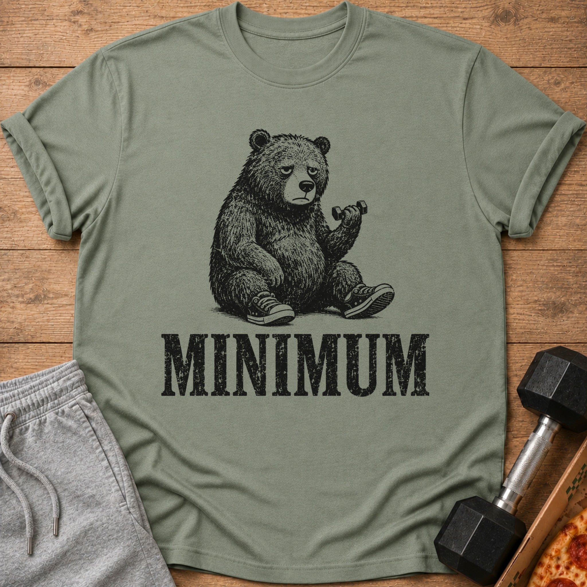 T-shirt with distressed graphic of a bear lifting a dumbbell and the word MINIMUM.