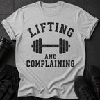 Grey t-shirt with "Lifting and Complaining" text and a barbell graphic.