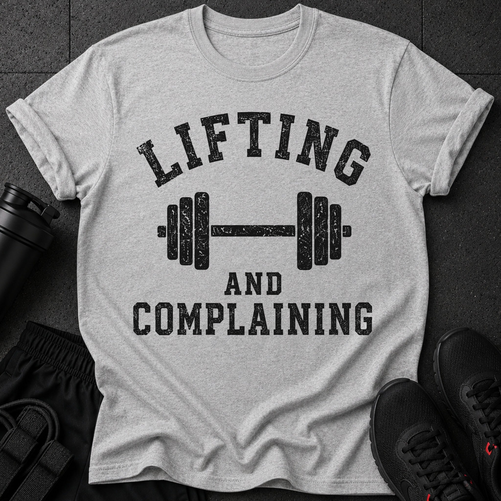 Grey t-shirt with "Lifting and Complaining" text and a barbell graphic.