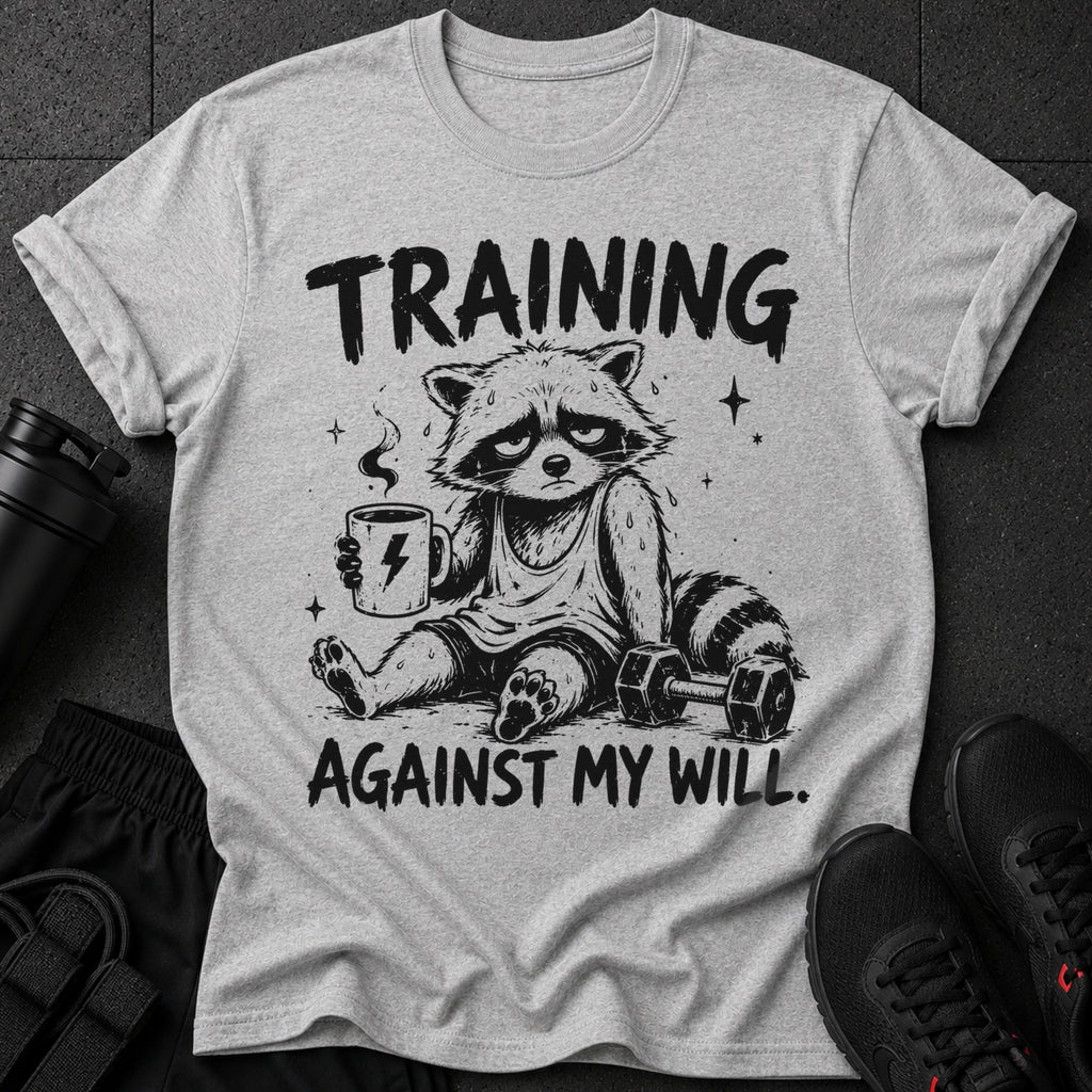 T-shirt with distressed graphic of tired raccoon holding coffee, "TRAINING AGAINST MY WILL."