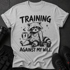 T-shirt with distressed graphic of tired raccoon holding coffee, "TRAINING AGAINST MY WILL."