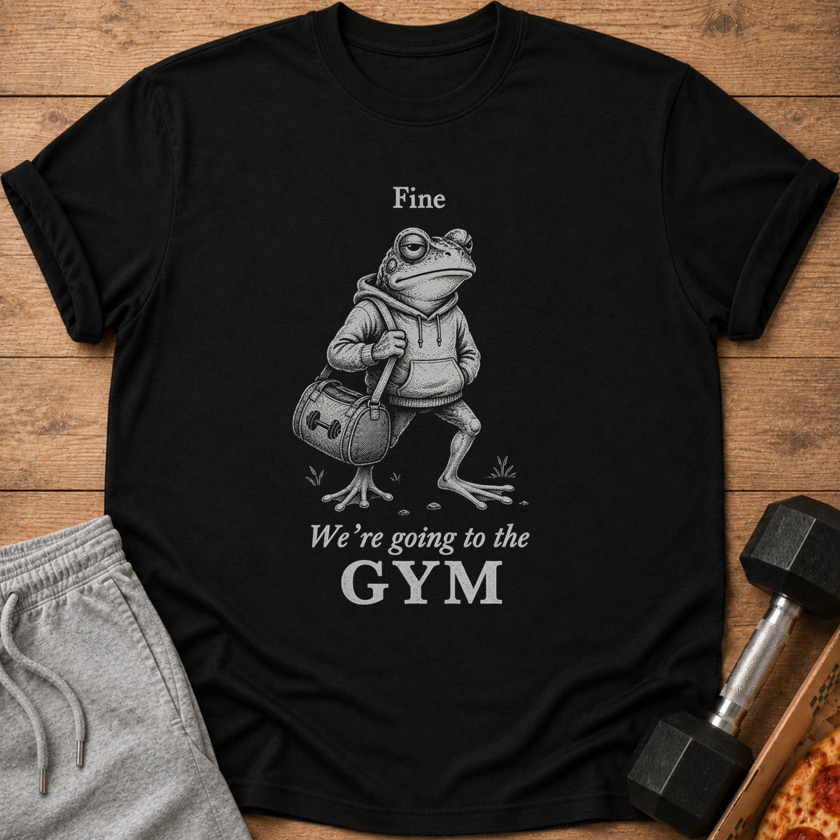 Black t-shirt with a frog in a hoodie holding a gym bag, text "Fine We're going to the GYM".