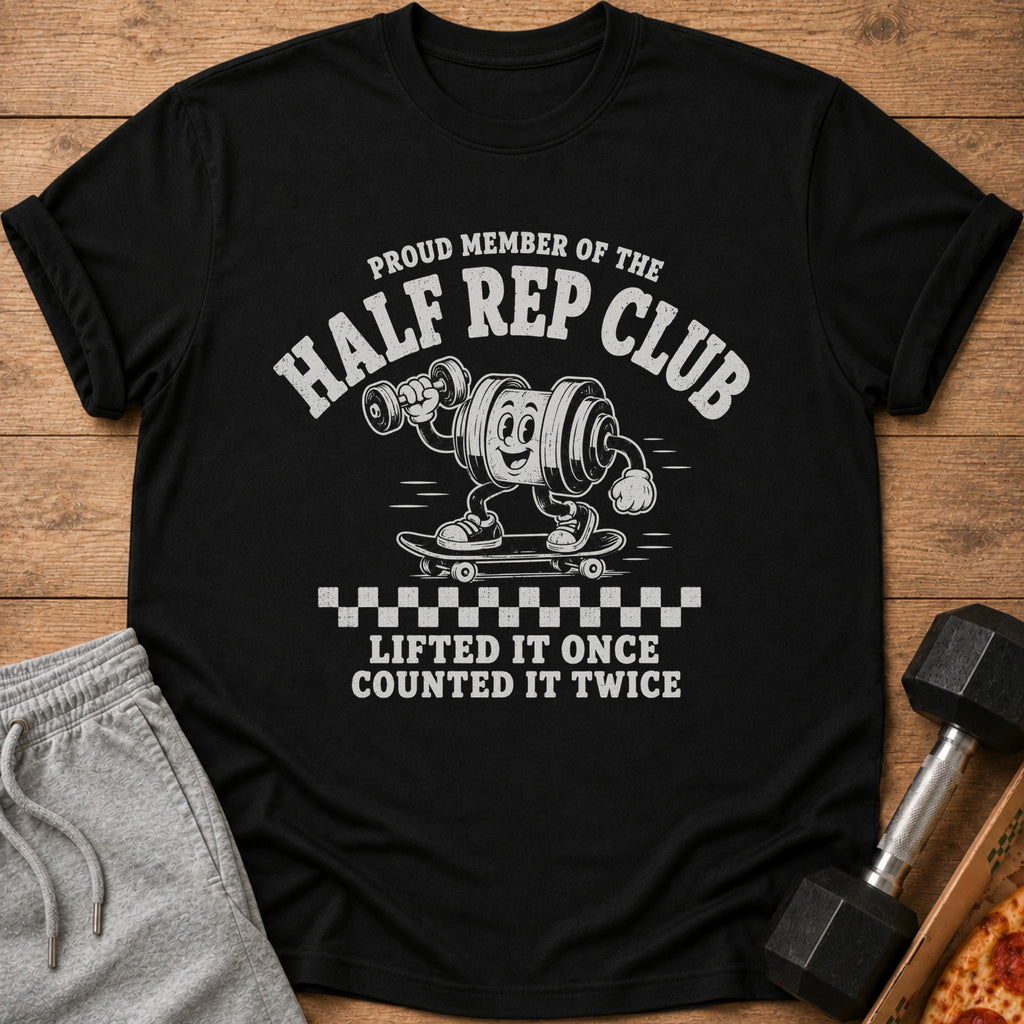 Black t-shirt with "Proud Member of the Half Rep Club" and barbell cartoon.