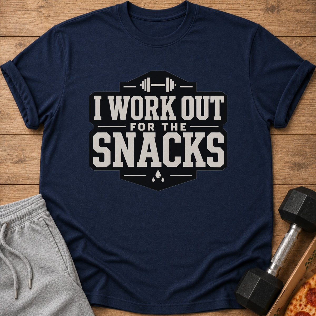 Navy t-shirt with "I WORK OUT FOR THE SNACKS" text and dumbbell graphic.