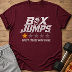 Maroon t-shirt with "BOX JUMPS" text, a skull, and one star.