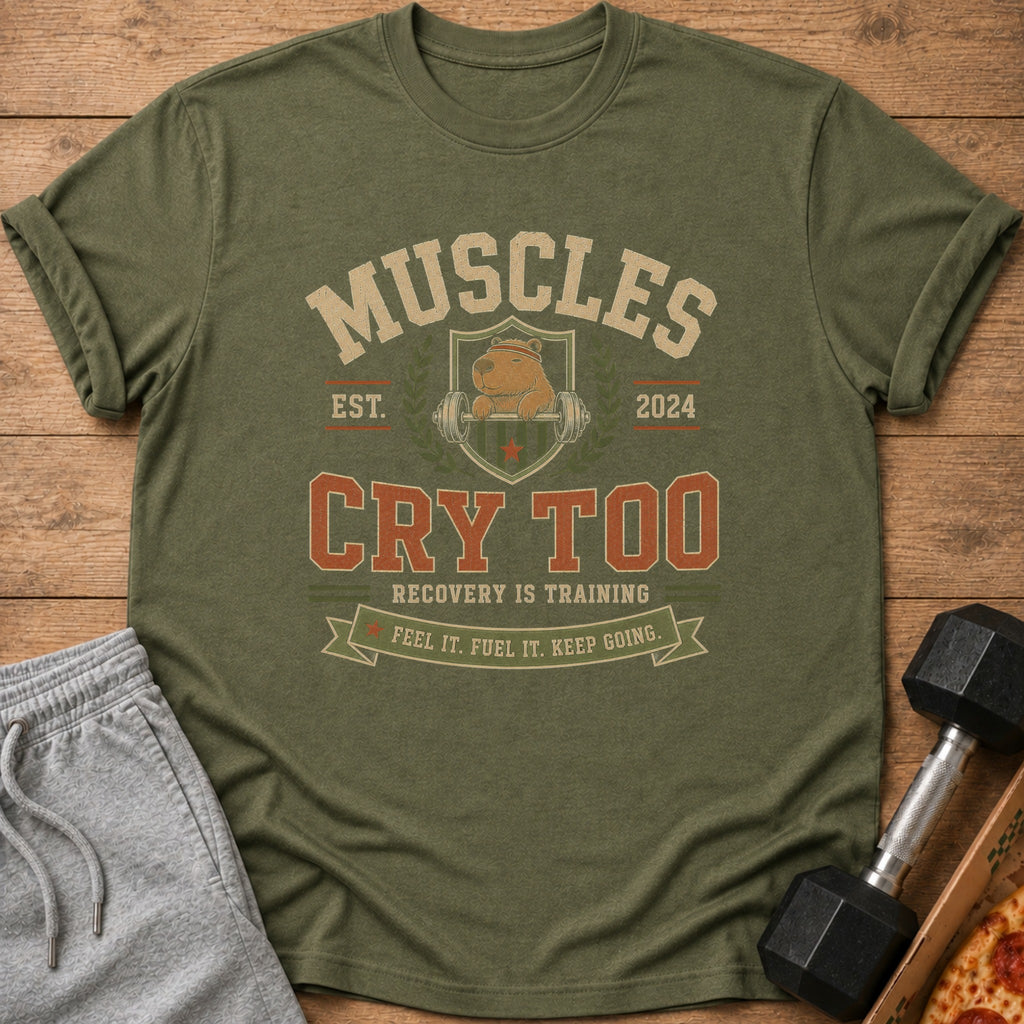 Green t-shirt with "Muscles Cry Too" text and a capybara lifting weights.
