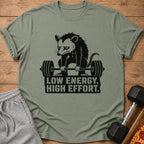 Sad opossum lifting barbell with text "LOW ENERGY. HIGH EFFORT."