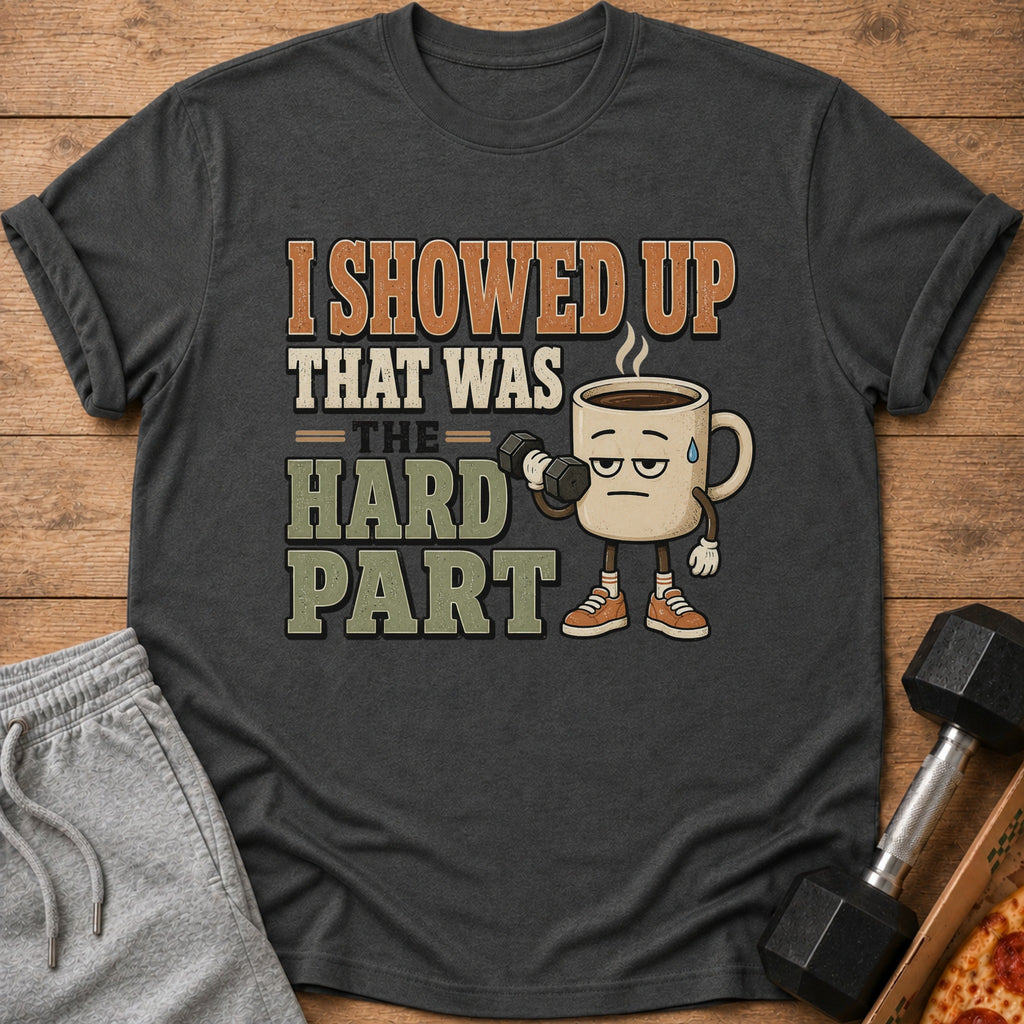 T-shirt with "I showed up that was the hard part" text and a tired coffee cup lifting dumbbell.