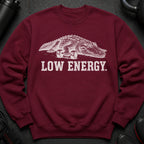 Maroon sweatshirt with white graphic of alligator holding dumbbells and text "LOW ENERGY."
