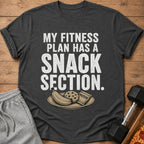 Dark grey t-shirt with text "MY FITNESS PLAN HAS A SNACK SECTION."