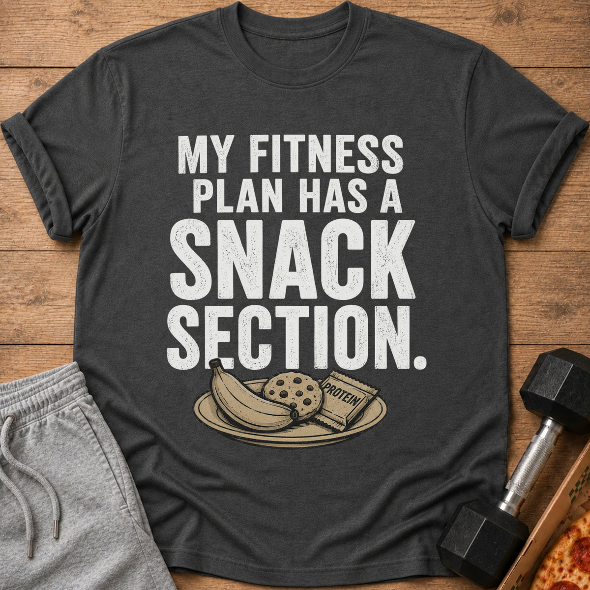 Dark grey t-shirt with text "MY FITNESS PLAN HAS A SNACK SECTION."