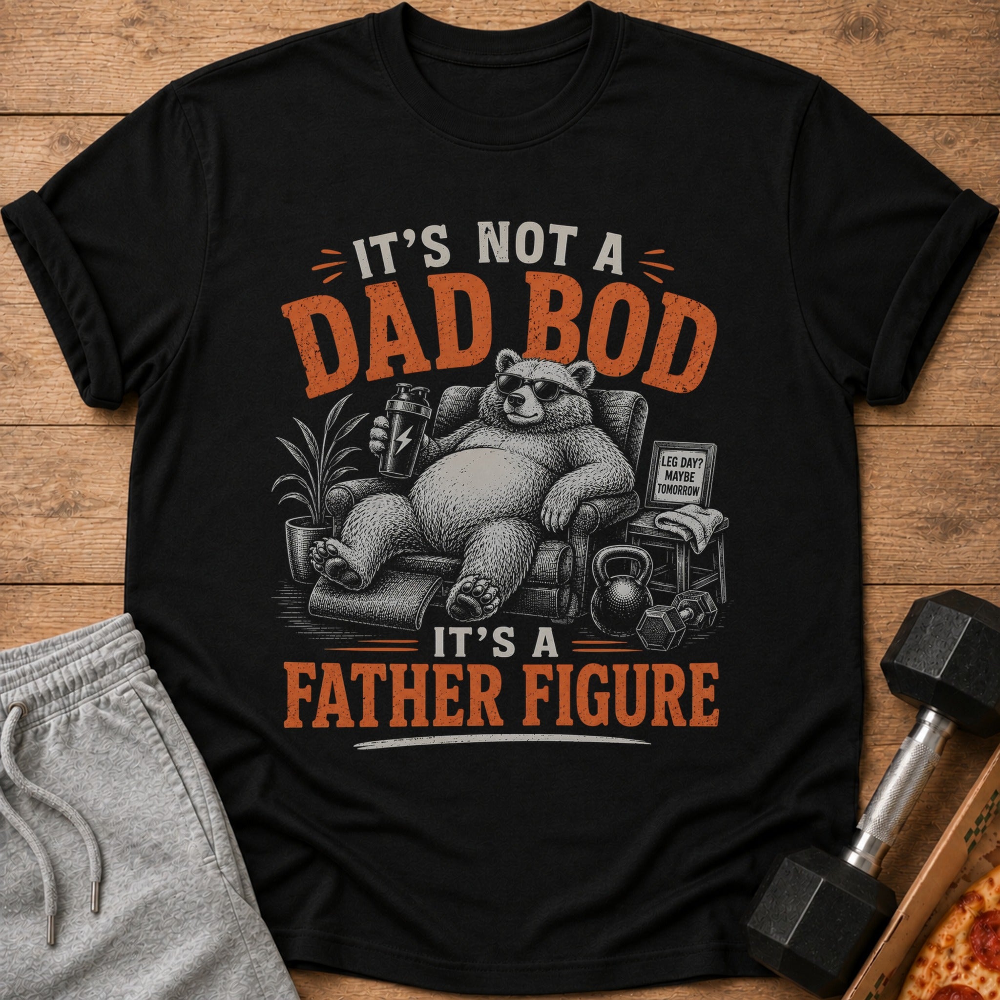 Black t-shirt with graphic: "IT'S NOT A DAD BOD. IT'S A FATHER FIGURE."