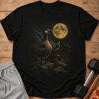 Black t-shirt with a goose design under a large moon and starry sky.