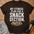 Brown t-shirt with "My Fitness Plan Has A Snack Section" text and snack plate graphic.