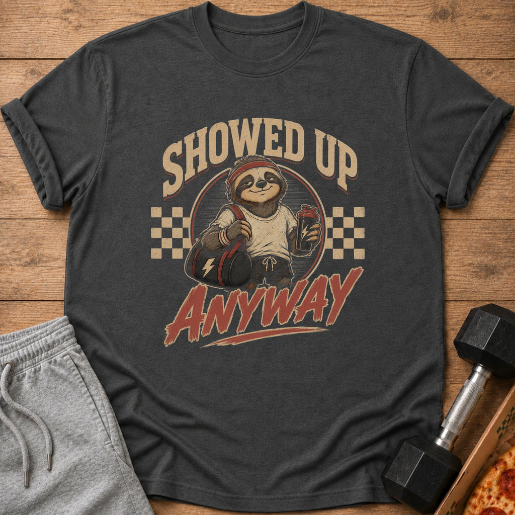 T-shirt with graphic of sloth in gym clothes holding gym bag and shaker, text "SHOWED UP ANYWAY".