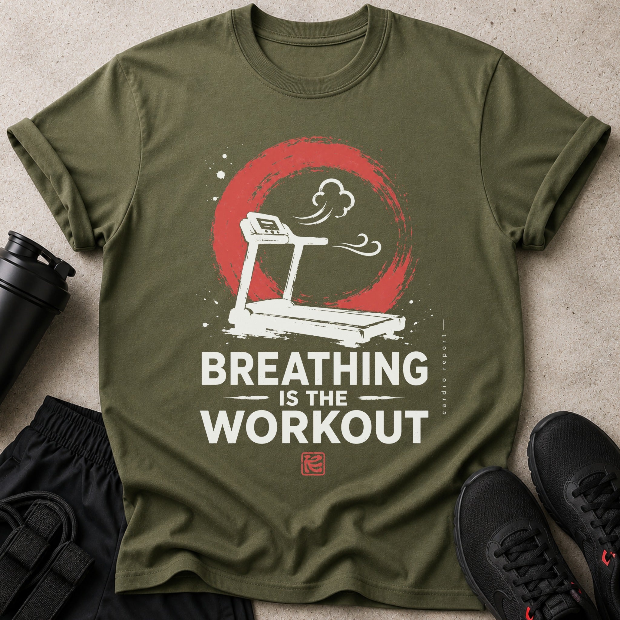 Olive green t-shirt with "Breathing is the workout" graphic design.