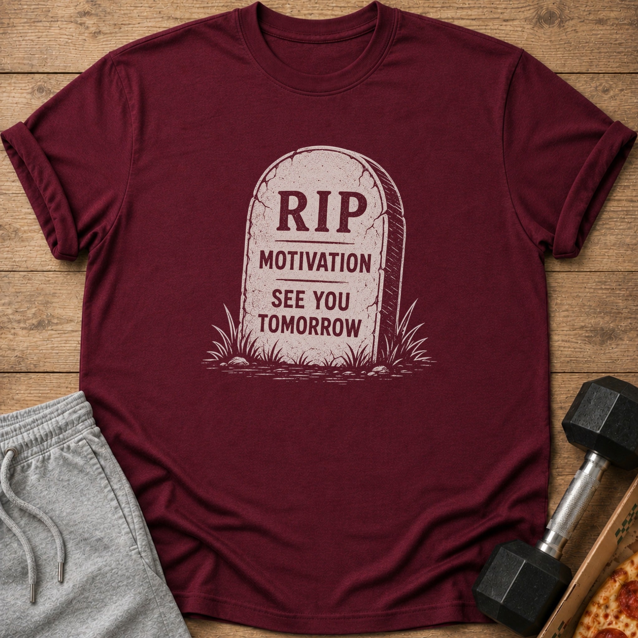 Maroon t-shirt with tombstone graphic reading "RIP Motivation See You Tomorrow."