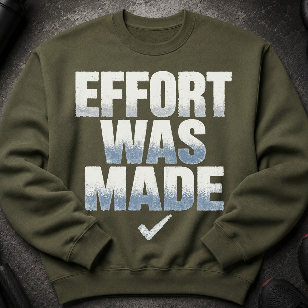 Olive green sweatshirt with "EFFORT WAS MADE" and a checkmark graphic.