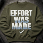Olive green sweatshirt with "EFFORT WAS MADE" and a checkmark graphic.