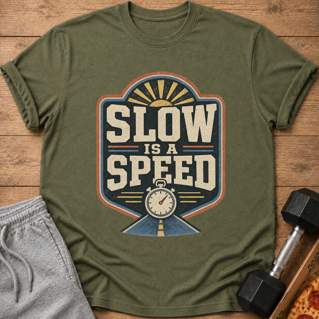 Green t-shirt with "SLOW IS A SPEED" graphic, stopwatch, and sun.