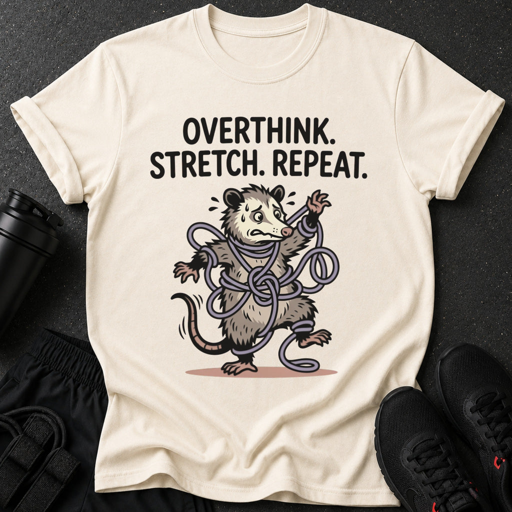 Graphic tee with text "OVERTHINK. STRETCH. REPEAT." and a tangled opossum illustration.