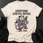 Graphic tee with text "OVERTHINK. STRETCH. REPEAT." and a tangled opossum illustration.