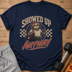 Navy t-shirt with a sloth wearing a headband, holding a gym bag and shaker, with text "SHOWED UP ANYWAY".
