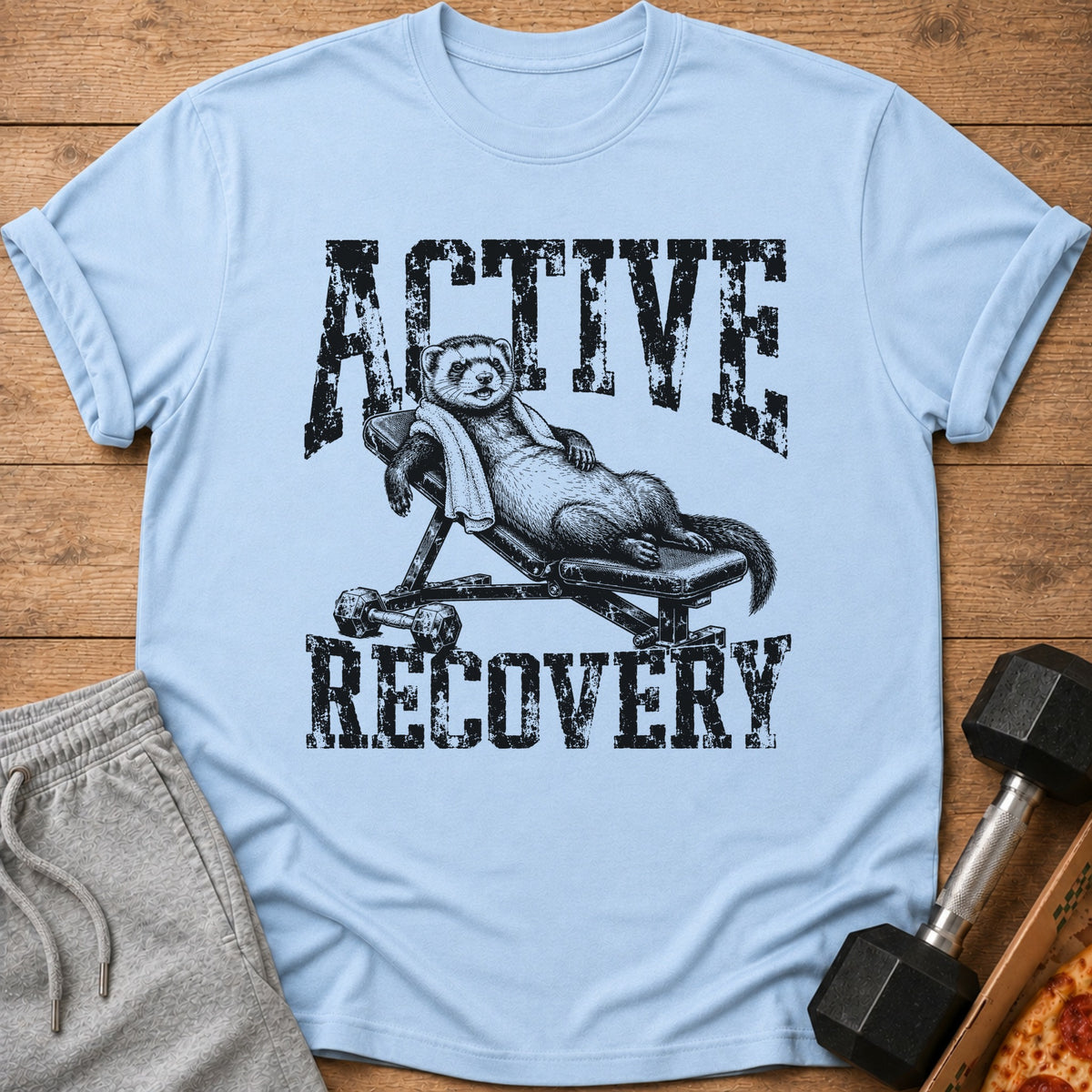 Ferret relaxing on weight bench with text "ACTIVE RECOVERY".