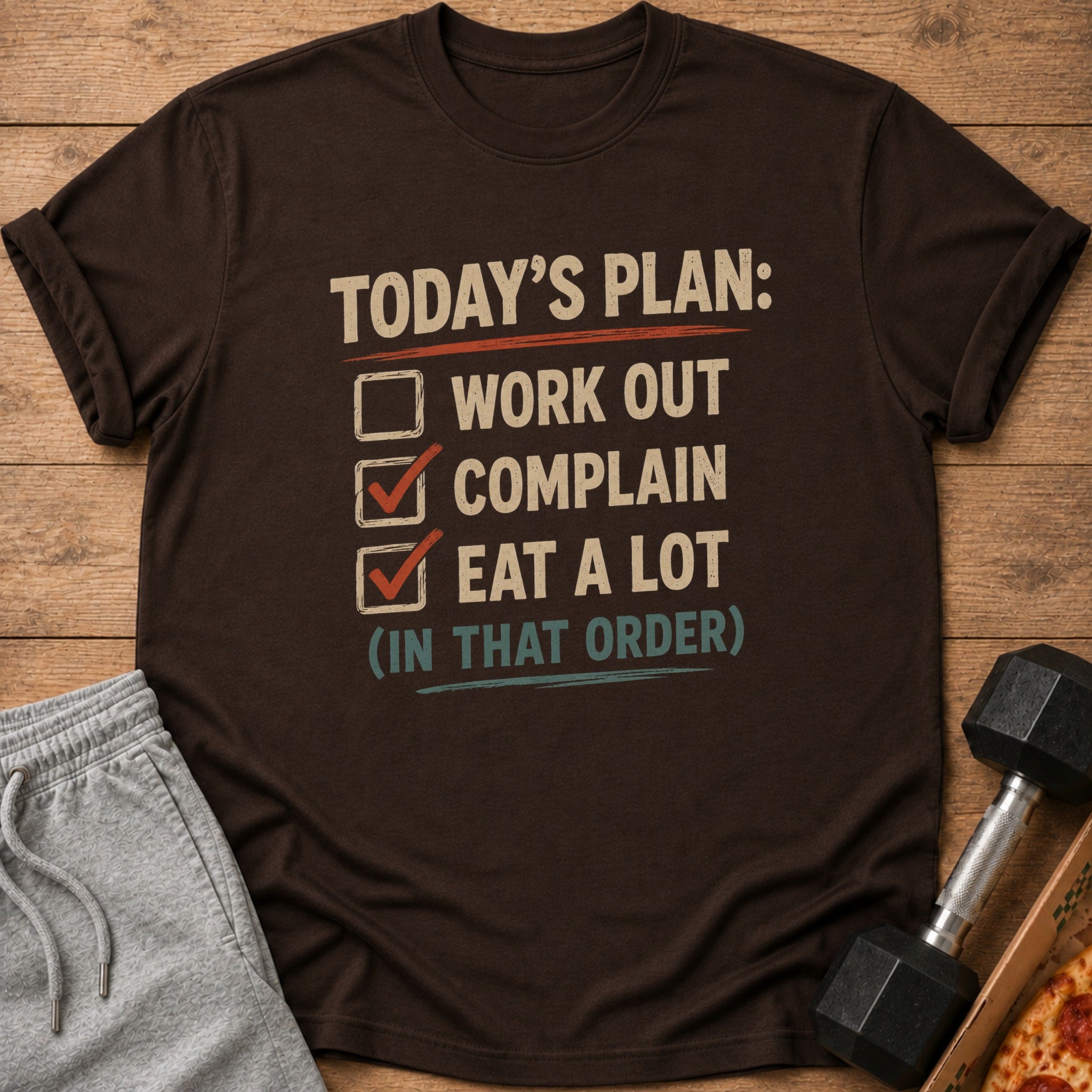 Brown t-shirt with "Today's Plan: Work Out, Complain, Eat a Lot (In That Order)" graphic.