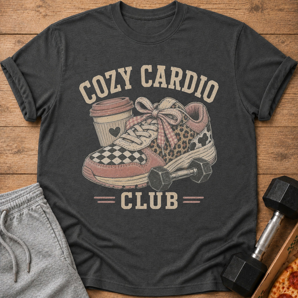 T-shirt graphic with text "Cozy Cardio Club" featuring a sneaker, coffee cup, and dumbbell.