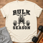 T-shirt with a distressed graphic of a moose lifting a barbell, text "BULK SEASON".