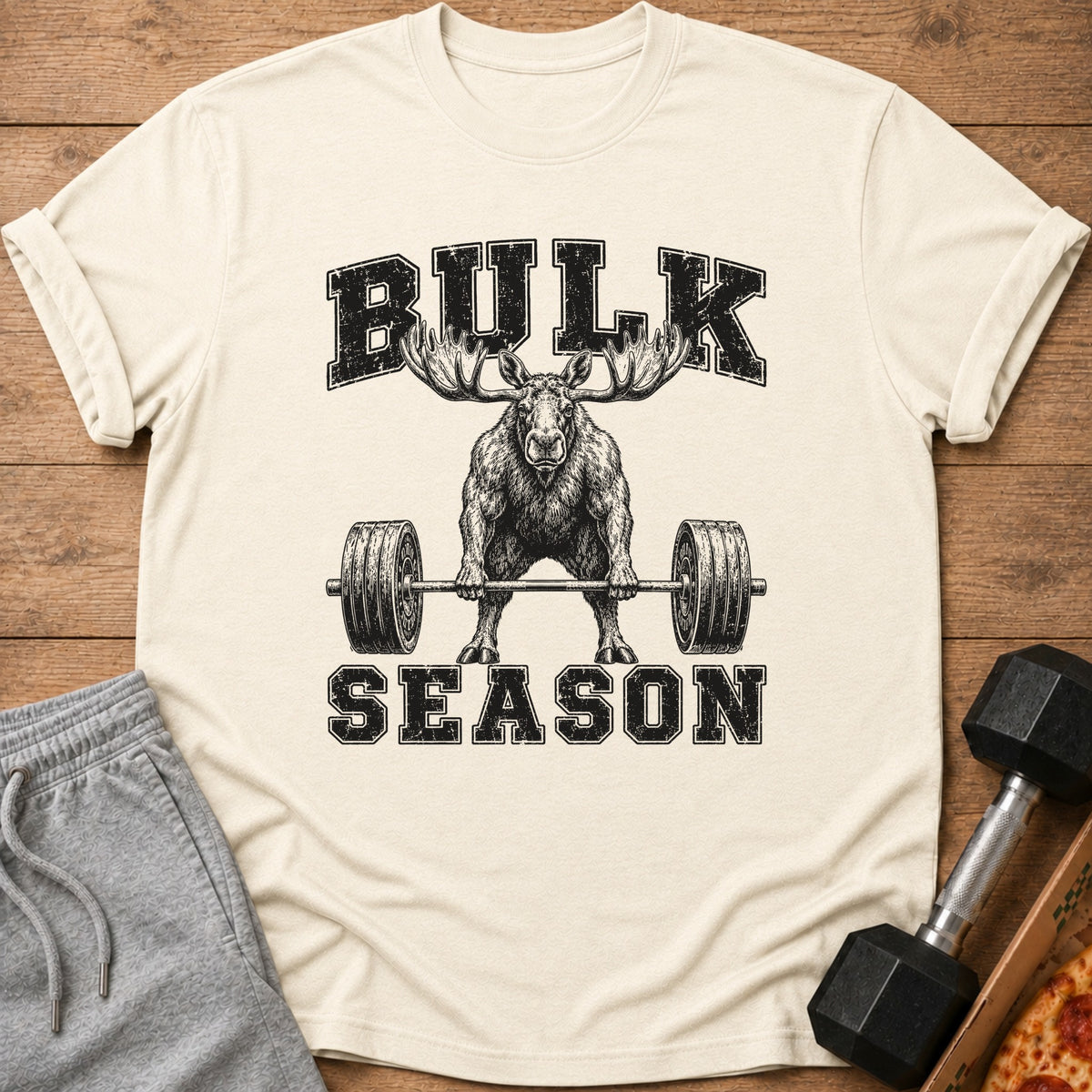 T-shirt with a distressed graphic of a moose lifting a barbell, text "BULK SEASON".