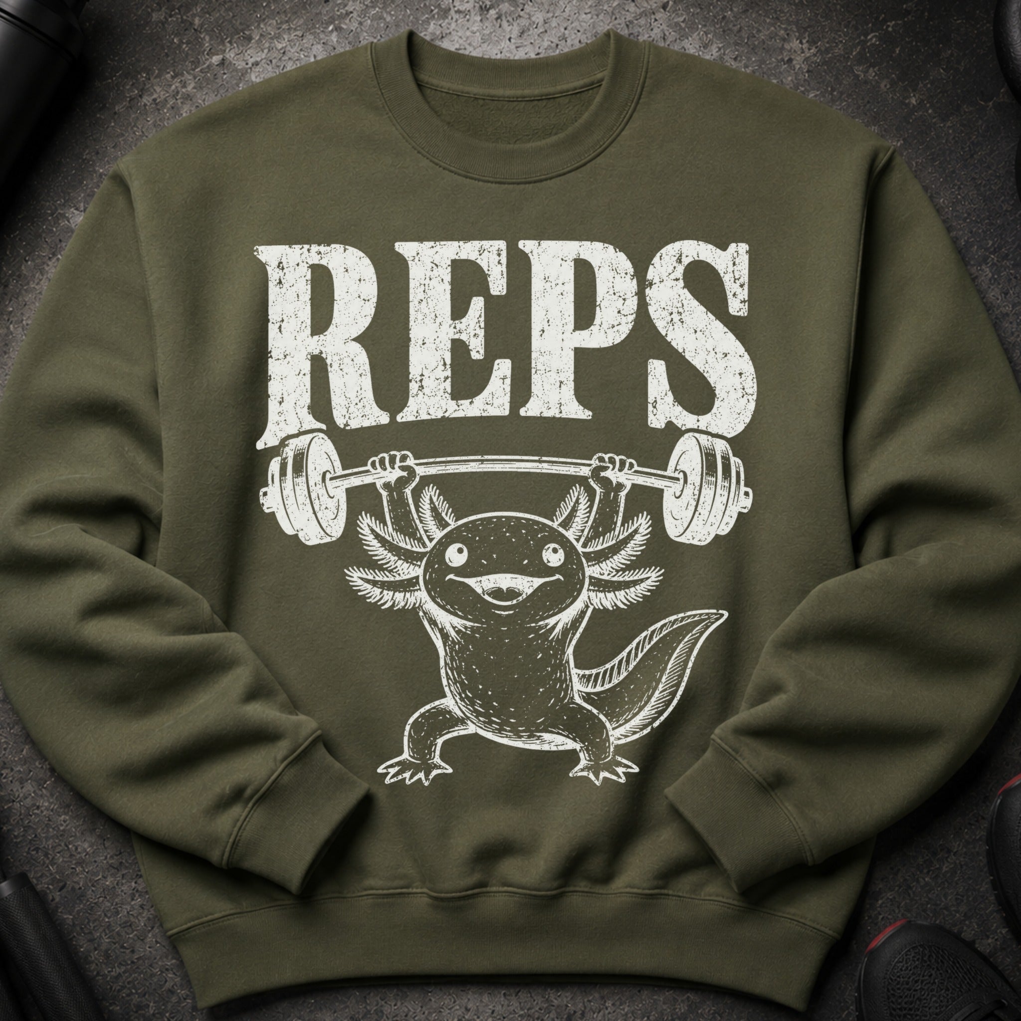 Green sweatshirt with white "REPS" text and an axolotl lifting a barbell.
