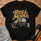 Black t-shirt with a possum lying on a foam roller and a bottle that reads "HYDRATE OR DIE-DRATED".